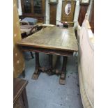 Good quality reproduction oak refectory dining table, the plank top with carved frieze raised on