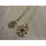 Circular 15ct gold pendant set amethyst and seed pearls on a gold plated chain together with a