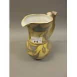 Alan Caiger-Smith for Aldermaston Pottery, lustre glazed baluster form jug with a stylised floral