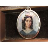 Mid 19th Century miniature oval portrait of a young lady with lace collar, inscribed verso ' W.