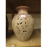 Large modern pottery vase with pierced and scroll work decoration