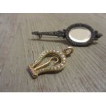 Unusual 19th Century yellow metal pearl set folding glove stretcher / button hook together with a