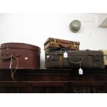 Vintage circular leather hat box, small leather suitcase and a simulated leather wooden bound travel