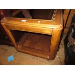 20th Century coffee table having glass inset top and undertier