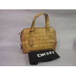 D.K.N.Y. leather simulated crocodile handbag, with dust cover