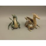 Pair of 20th Century lustre decorated pottery figures of dragons