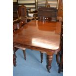 Victorian mahogany pull-out extending dining table, the rectangular moulded top raised on four