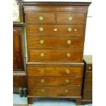 19th Century mahogany chest on chest, the moulded key pattern cornice above three short and three