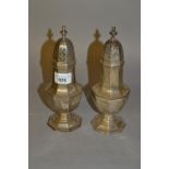 Pair of silver octagonal baluster form sugar casters