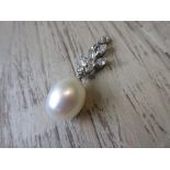 White metal diamond and pearl drop pendant