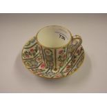 18th Century Sevres porcelain cabinet cup and saucer painted with horizontal bands of roses and