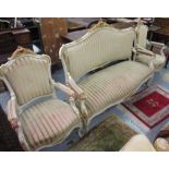 Late 19th Century Continental cream painted and gilded three piece sitting room suite, the shaped
