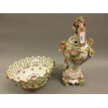 Late 19th Century Continental porcelain vase and cover decorated with applied flowers and figures of