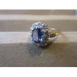 18ct Yellow gold oval sapphire and diamond cluster ring