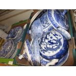 Two boxes containing a collection of late 19th and 20th Century blue and white pottery, including: