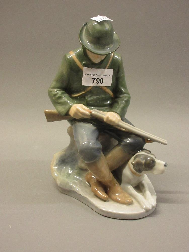 Royal Copenhagen figure of a hunter with dog by C. Thomsen, No. 1021084