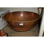 Large two handled copper bowl