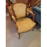 Pair of French walnut and upholstered open armchairs in Louis XV style