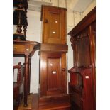 Pair of mahogany bedside cabinets, each with a rectangular panelled door