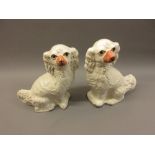 Pair of 19th Century Staffordshire pottery figures of spaniels