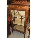 Edwardian mahogany single door display cabinet with floral painted and swag decoration