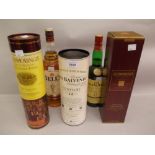 Four bottles of single malt whisky, the Balvenie, two Glenmorangie and one Glenlivet together with