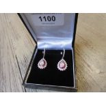 Pair of ruby and diamond drop earrings, the rose cut central diamonds approximately 1.20ct total