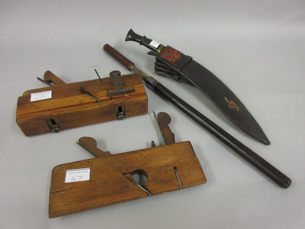 Antique kukri with horn grip, a leather cased dagger and two moulding planes