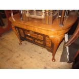 Early 20th Century walnut D-shaped wind-out extending dining table with single extra leaf, raised on