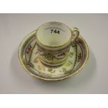 18th Century Sevres porcelain cabinet cup and saucer painted with roses and green garlands, signed