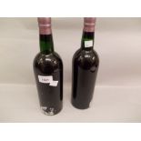 Two bottles Martinez, 1963 vintage port bottled by John Harvey (minus labels) One to mid shoulder,