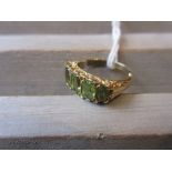 9ct Yellow gold five stone peridot dress ring