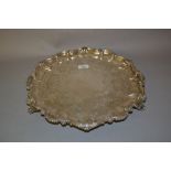 Victorian Scottish silver salver, the shell and scroll pattern moulded rim enclosing a floral