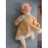 Armand Marseille, bisque headed baby doll with fixed eyes, open mouth and two teeth, marked 351/4.