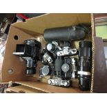 Box containing a collection of cameras including: Mamiya Medium Format SLR, six various SLR cameras,