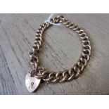 9ct Yellow gold curb link bracelet with padlock clasp 12g