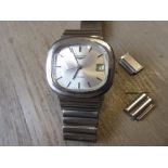 Gentleman's Longines steel cased wristwatch with silvered dial and date aperture, having an