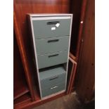 Mid 20th Century metal storage cabinet with six drop-front doors