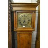 18th Century oak longcase clock with square hood and rectangular panel door, the brass dial with