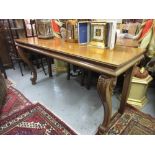 George IV mahogany side table, the moulded top on carved scroll shaped front supports, 72ins wide