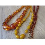 Small quantity of various amber coloured bead necklaces