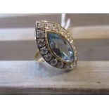 18ct Yellow gold aquamarine and diamond marquise cluster ring Ring size N. This has a white gold