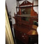 Late Victorian walnut chiffonier in Aesthetic style with a mirrored shelf back above a drawer,