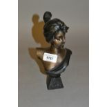 Small dark patinated bronze head and shoulder bust of a girl in Art Nouveau style, 9ins high