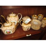 19th Century Paris porcelain tea service painted with panels of floral bouquets on a pale pink and