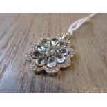 9ct Gold aquamarine and diamond set flower head pendant
