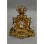 19th Century French gilded spelter and porcelain two train mantel clock, together with an American
