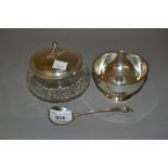 Georg Jensen silver serving spoon of stylised design, Elizabeth II Garrard & Co. circular silver
