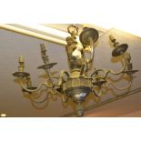 Heavy gilt brass eight branch chandelier