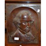 Square carved oak panel, a mahogany panel carved with a portrait and an Indian carved octagonal